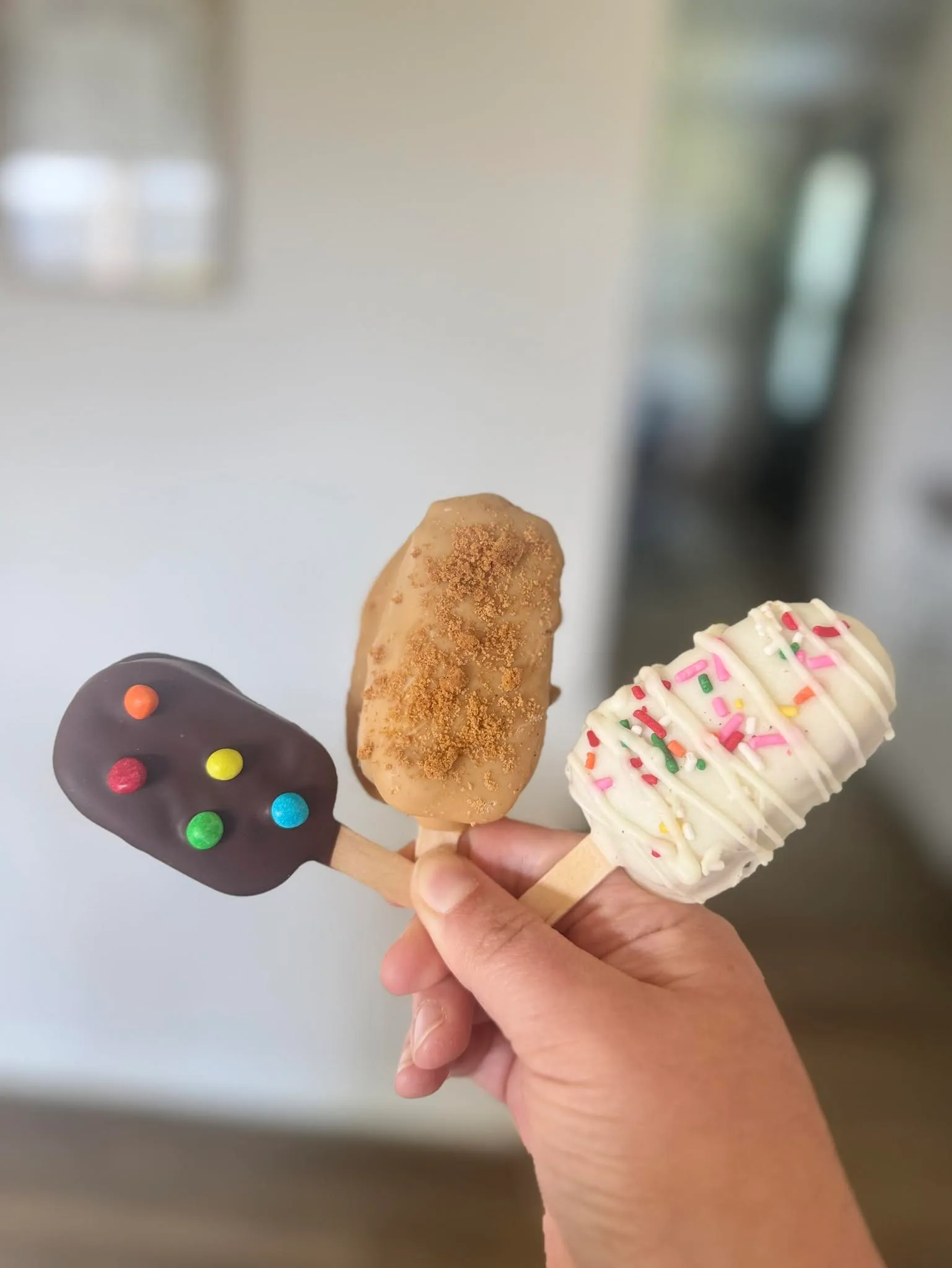 Cosmic brownie, funfetti, and cookie butter biscoff cakesicles